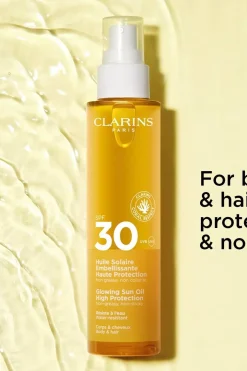 Clarins Aurinkotuotteet<Glowing Sun Oil SPF 30 for body & hair aurinkosuojaöljy 150 ml